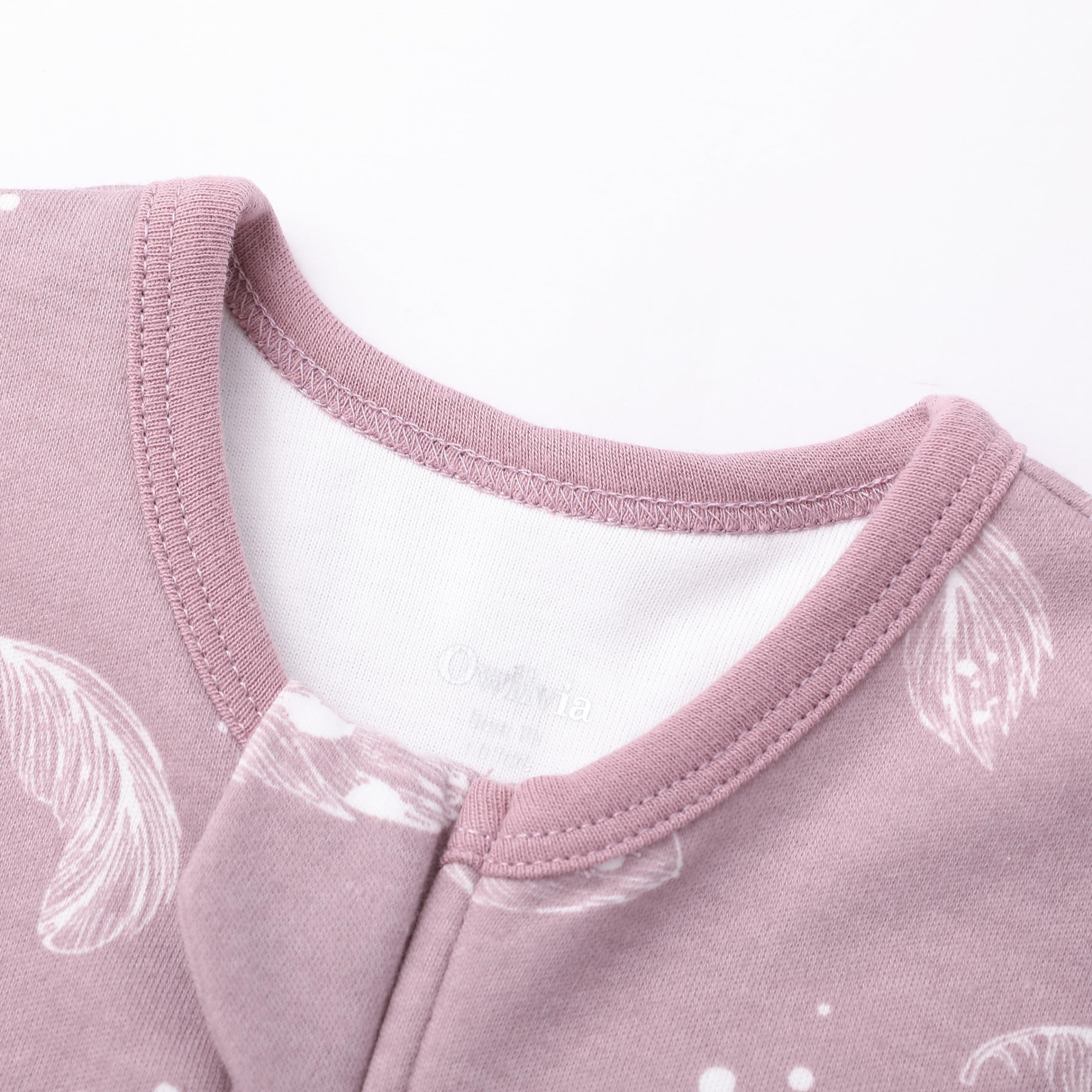 Owlivia vibrant mauve feather pattern highlights bedtime appeal for kids.
