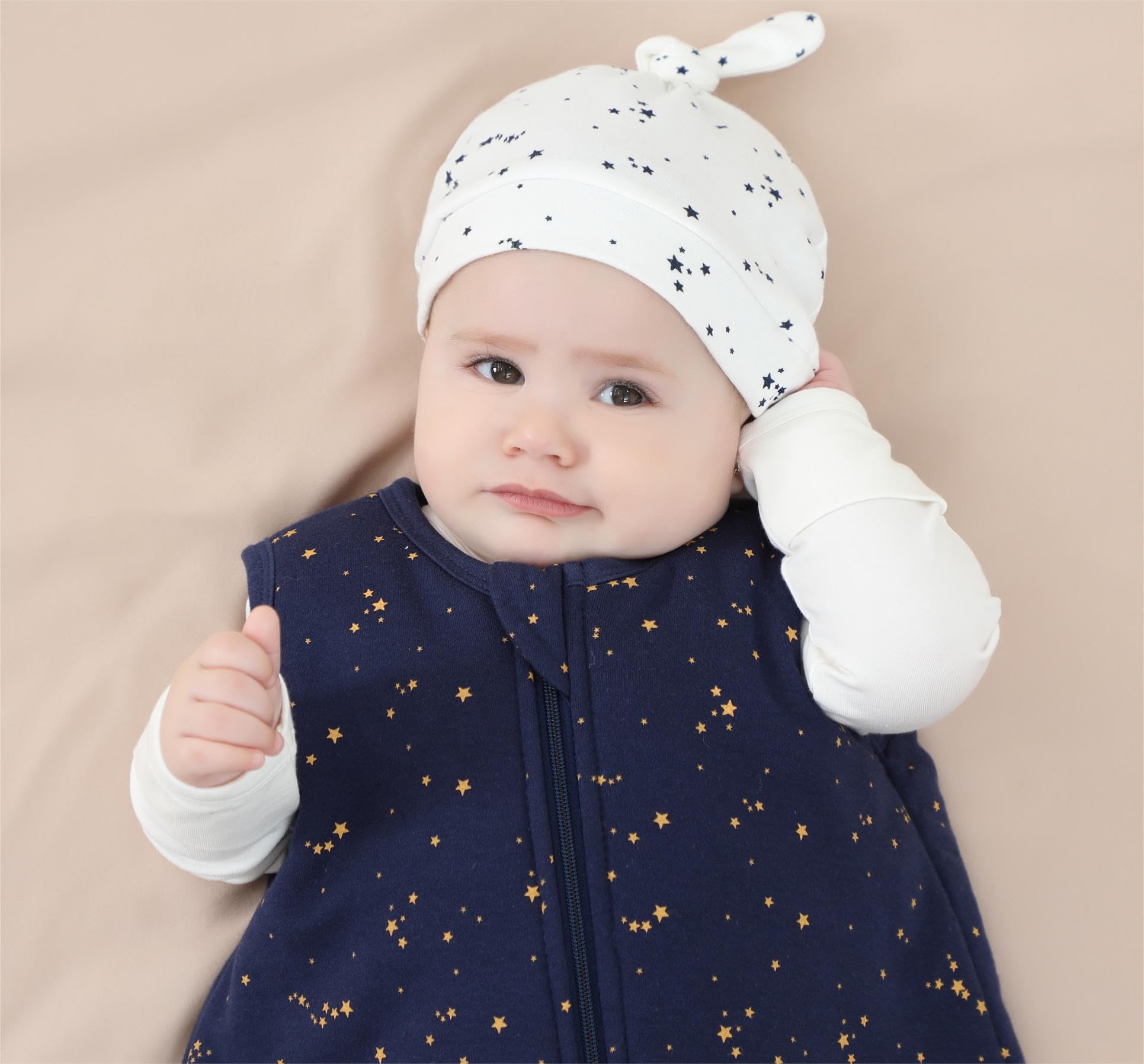Owlivia wearable blanket closeup highlights 2-way zipper for easy diaper changes.