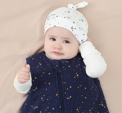 Owlivia wearable blanket closeup highlights 2-way zipper for easy diaper changes.