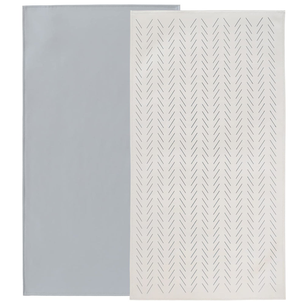Owlowla baby changing pad folded in gray herringbone for travel convenience