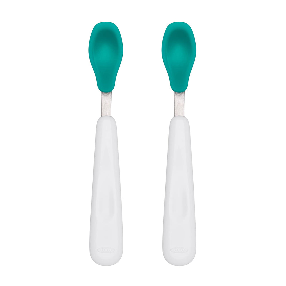 OXO Tot teal feeding spoon set close-up with soft silicone heads for gentle feeding