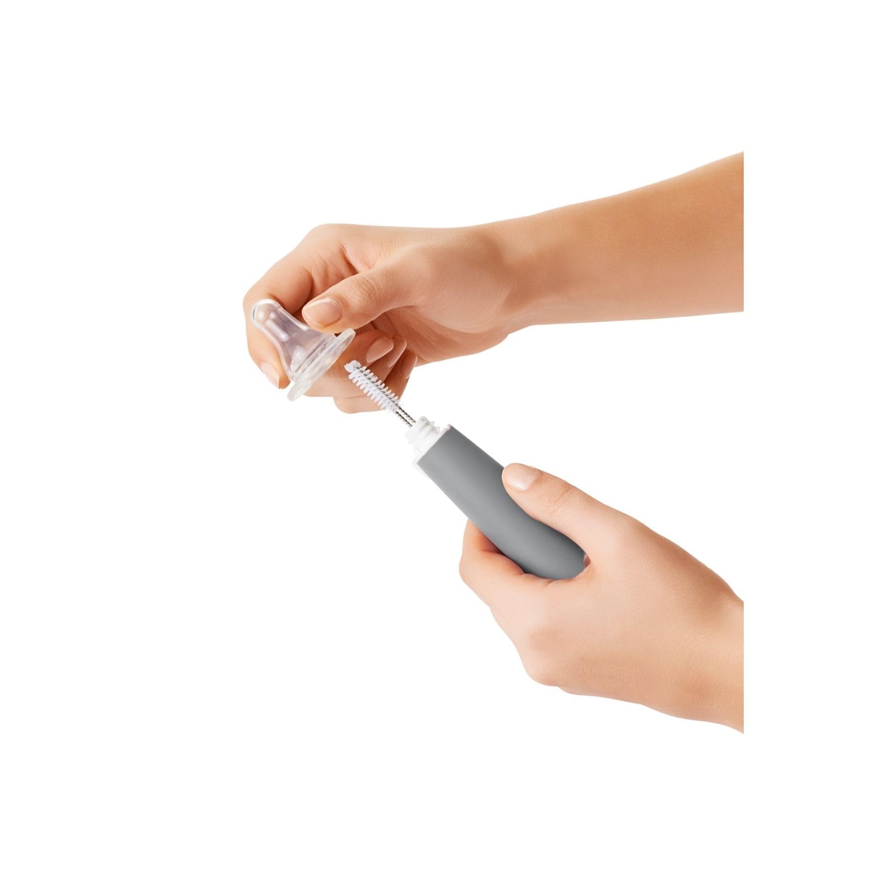 OXO Tot Non-Slip Handle ensures a secure grip during cleaning.