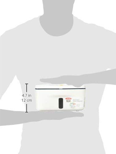 OXO Tot navy dispenser on changing table with non-slip feet for stability