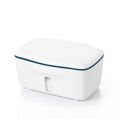 OXO Tot Perfect Pull Wipes Dispenser navy demonstrates one-handed wipe access.
