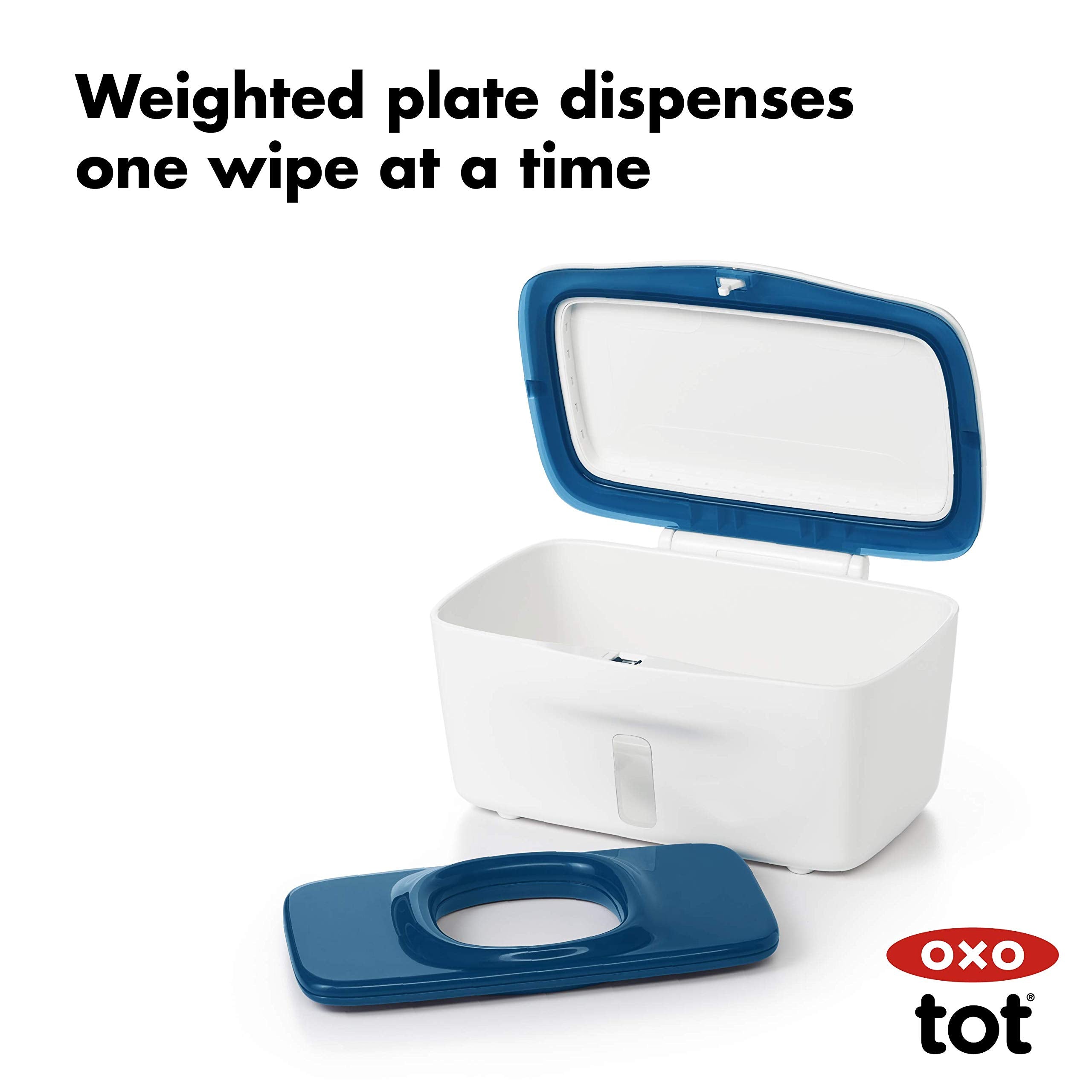 OXO Tot Perfect Pull Wipes Dispenser navy showing weighted plate for controlled dispensing.