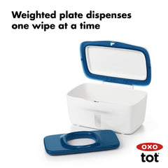 OXO Tot Perfect Pull Wipes Dispenser navy showing weighted plate for controlled dispensing.