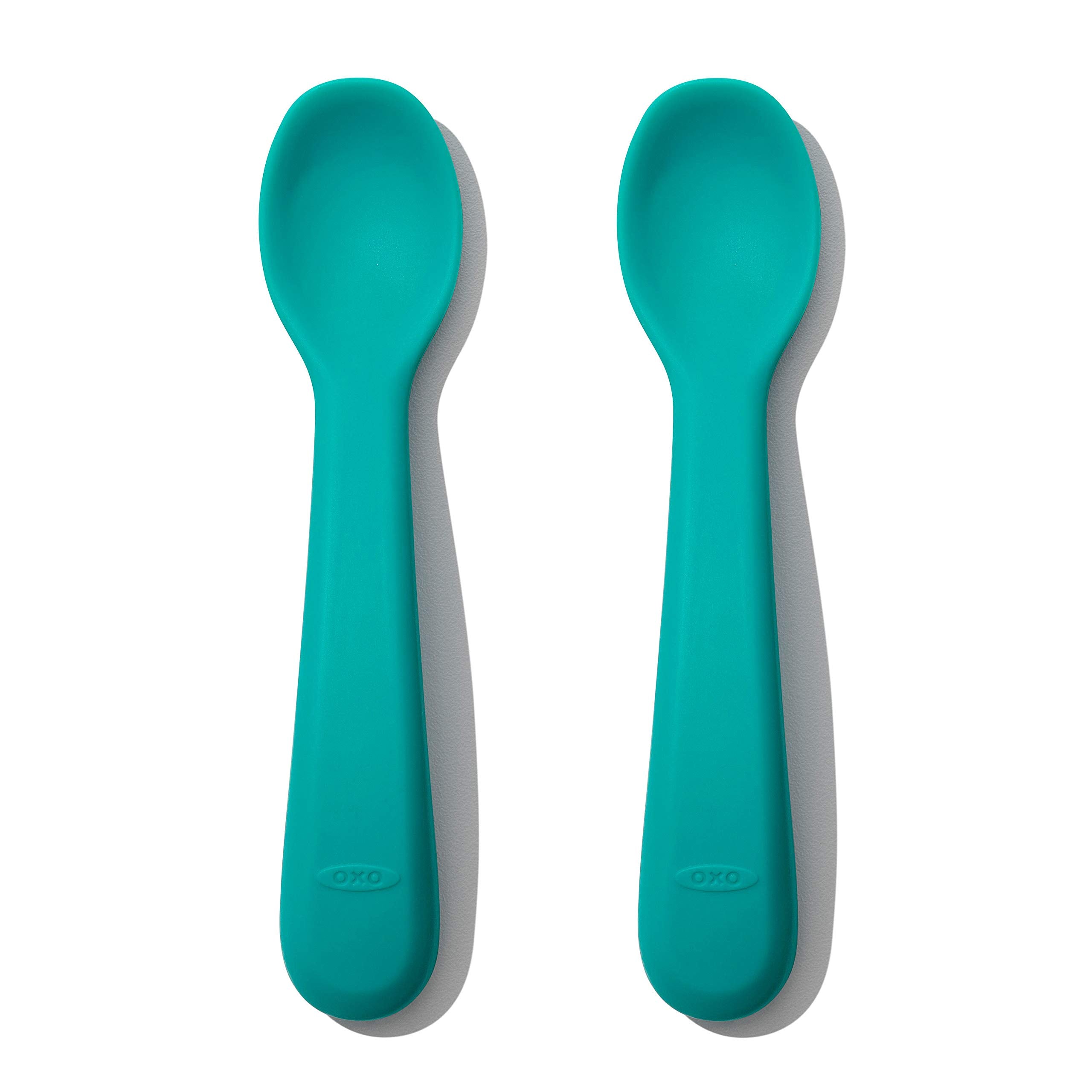 OXO Tot silicone spoons teal close-up, gentle on gums for self-feeding