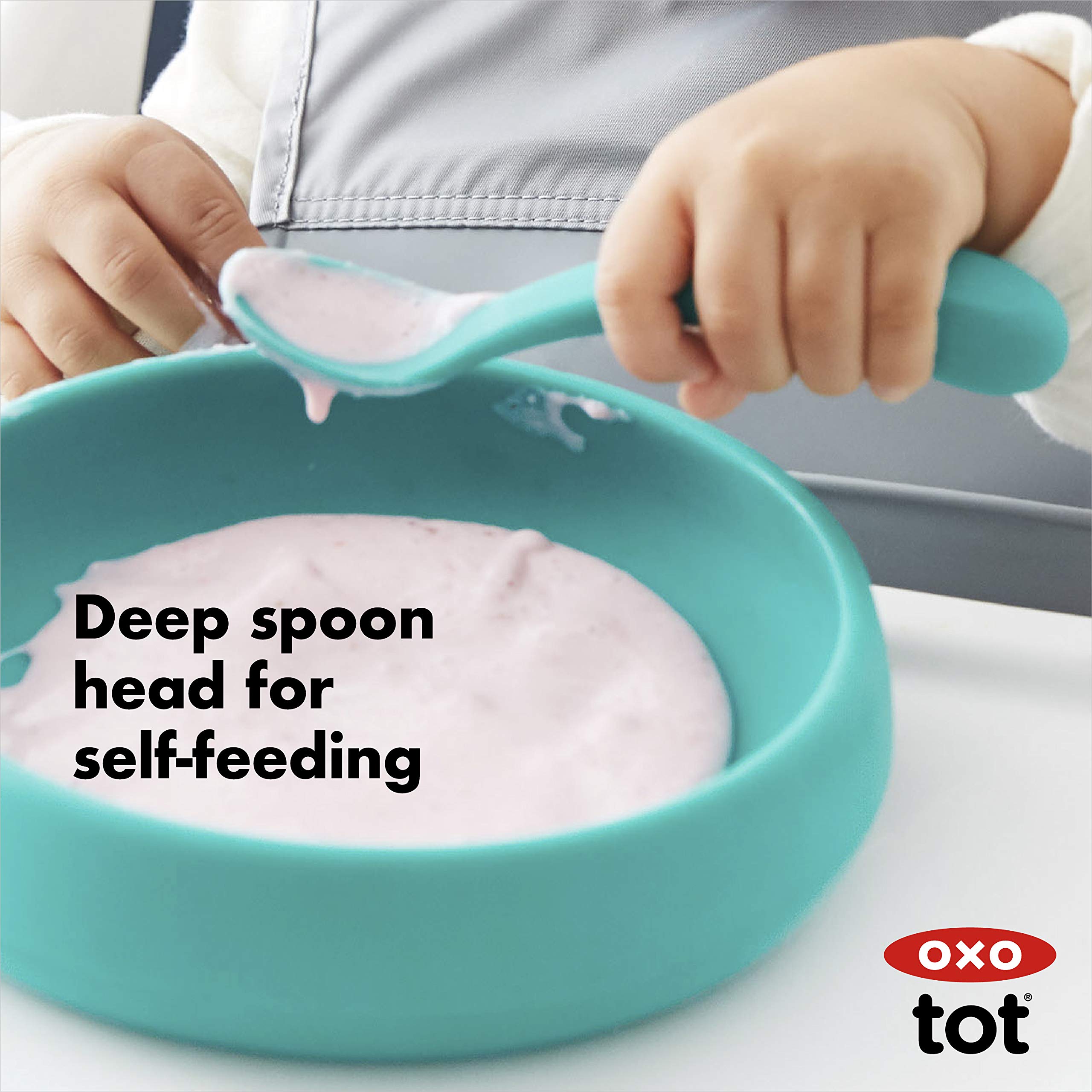 OXO Tot teal spoon curved handle fits tiny hands for self-feeding