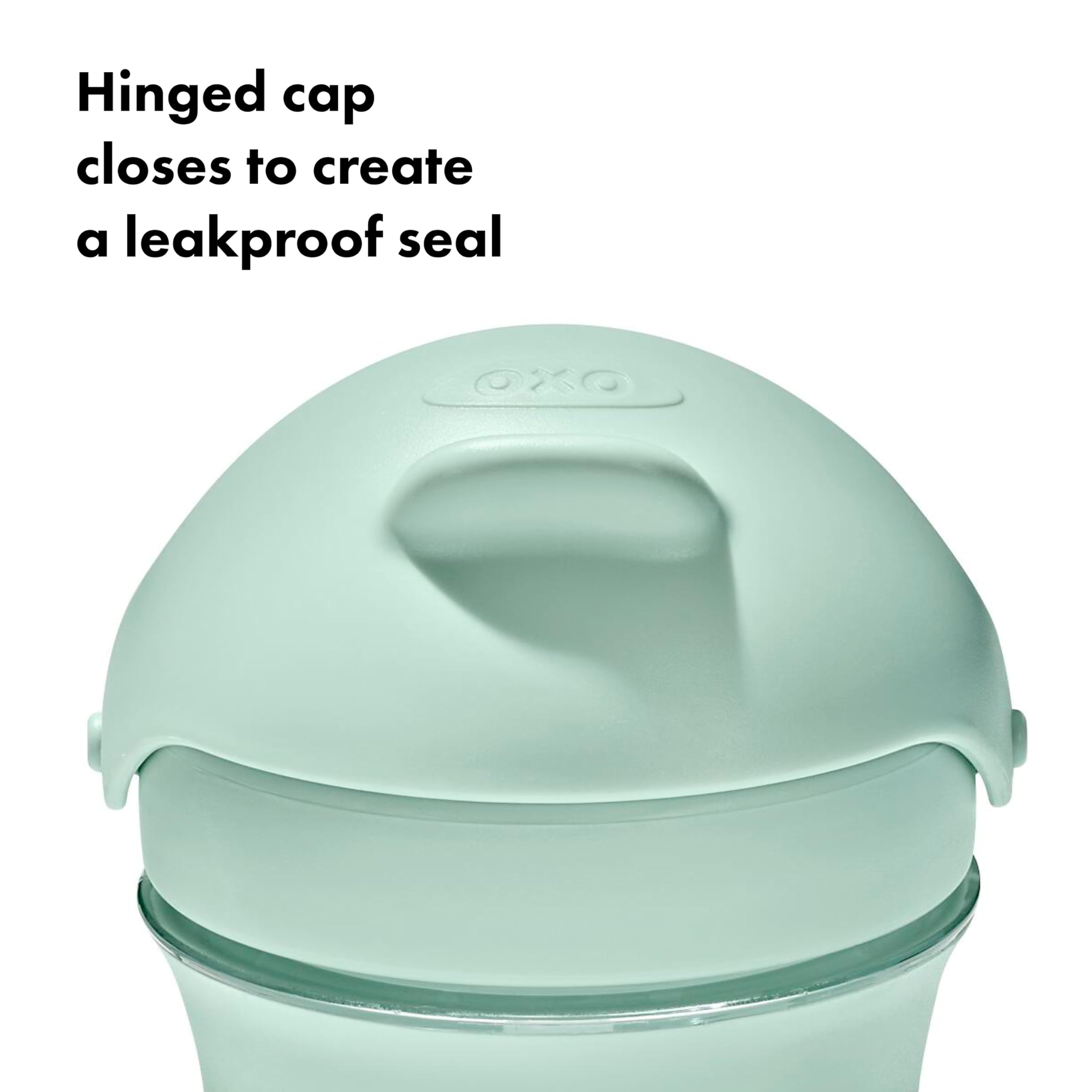 Oxo Tot Transitions Opal soft grip cup highlights non-slip handle and clear measurement markings.