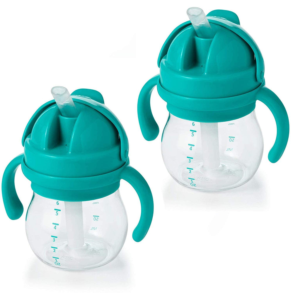 OXO Tot Transitions straw cup teal closed cap demonstrates a leak-proof design for mess-free meals.