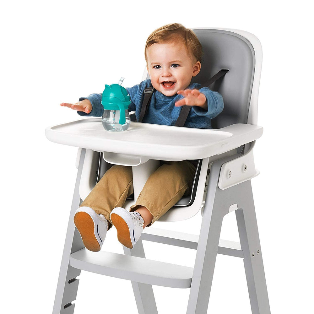 OXO Tot Transitions straw cup teal soft grip aids confident, controlled sipping.