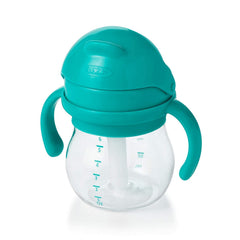 OXO Tot Transitions straw cup teal straw valve illustrates easy sipping as lips touch spout.
