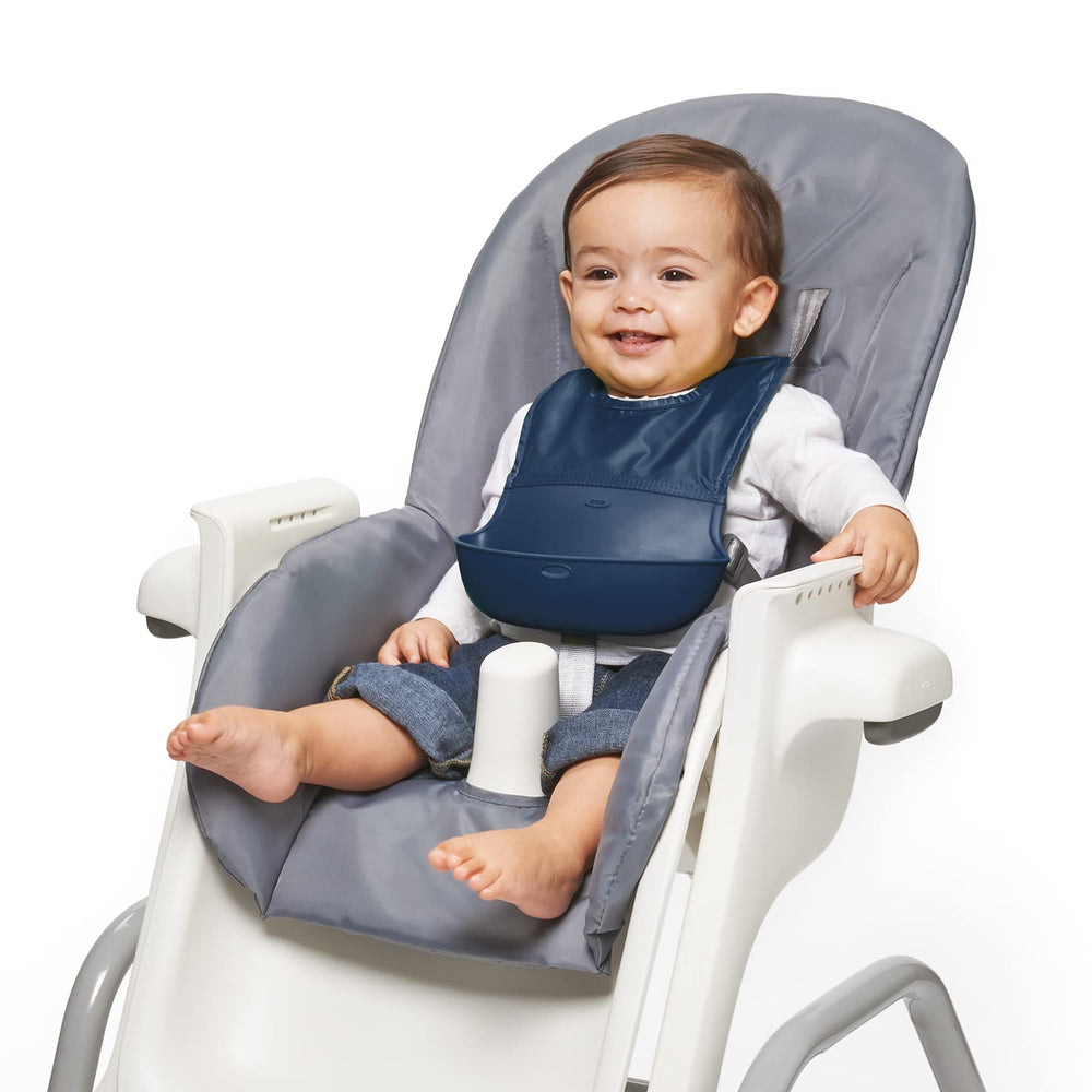 OXO Tot Roll-Up Bib provides full coverage to protect clothing from spills