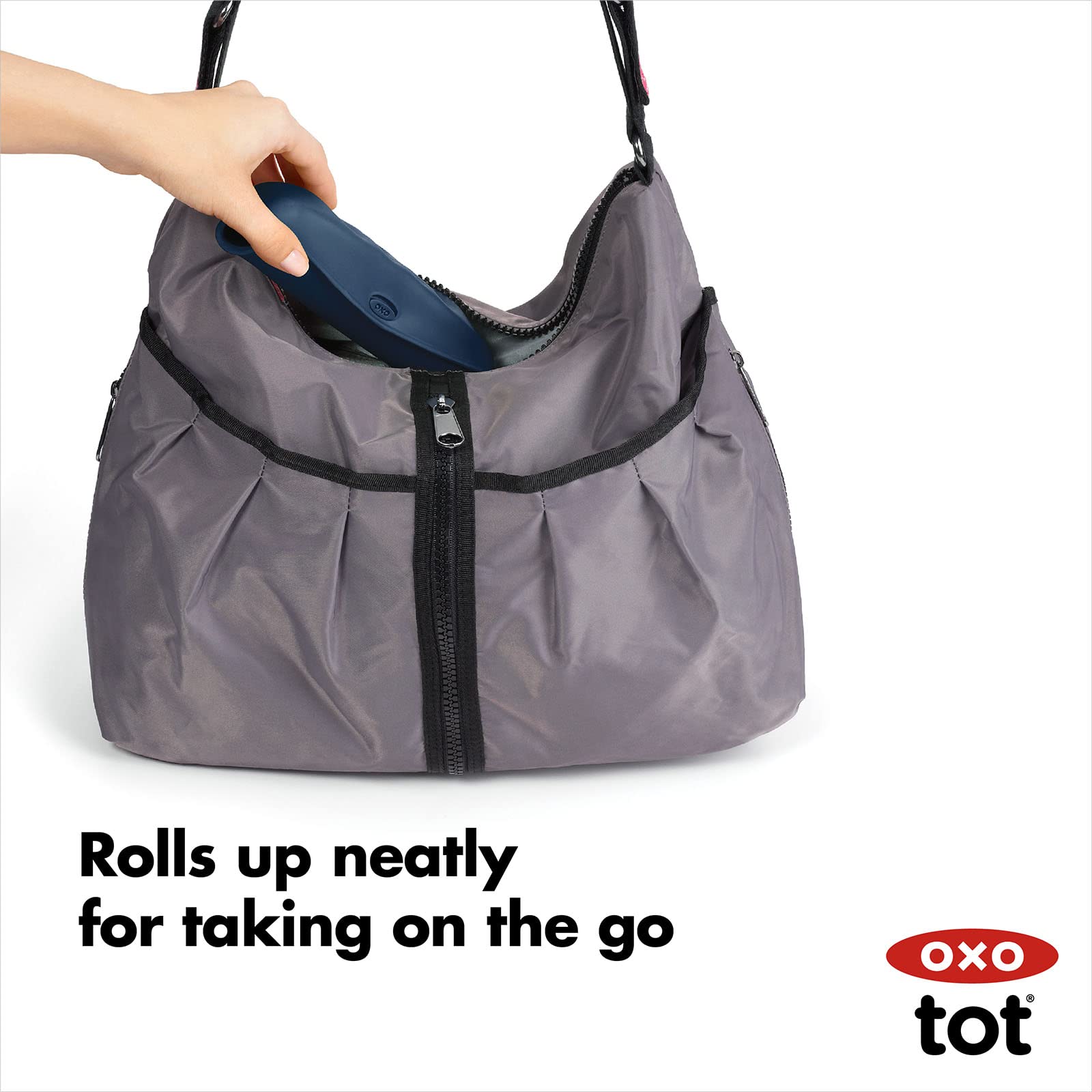 OXO Tot Roll-Up Bib silicone pocket rolls for compact, portable storage