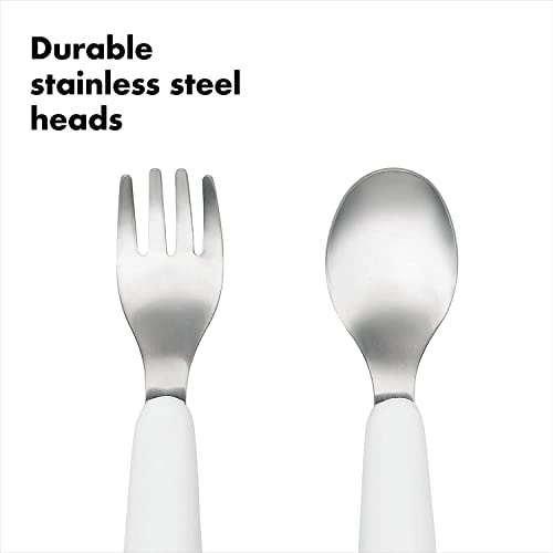 OXO Tot pink utensils keep bowls from sliding thanks to grip design.