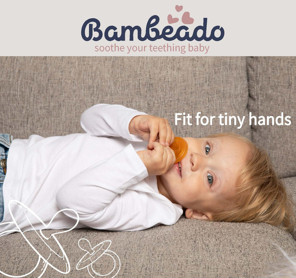 PaciBamber baby using pacifier-teether combo during teething.