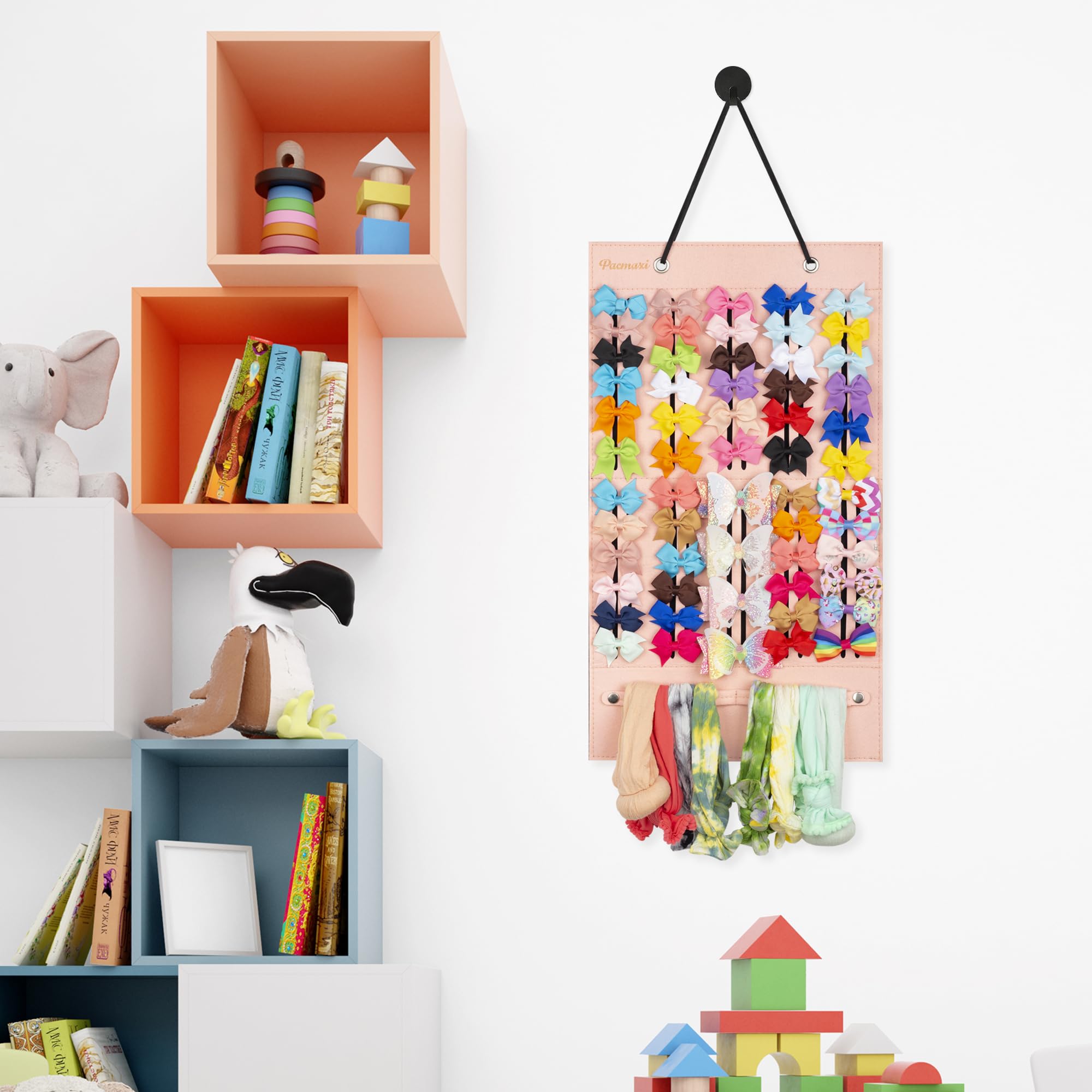 PACMAXI bow organizer on wall demonstrates easy access to headbands and clips