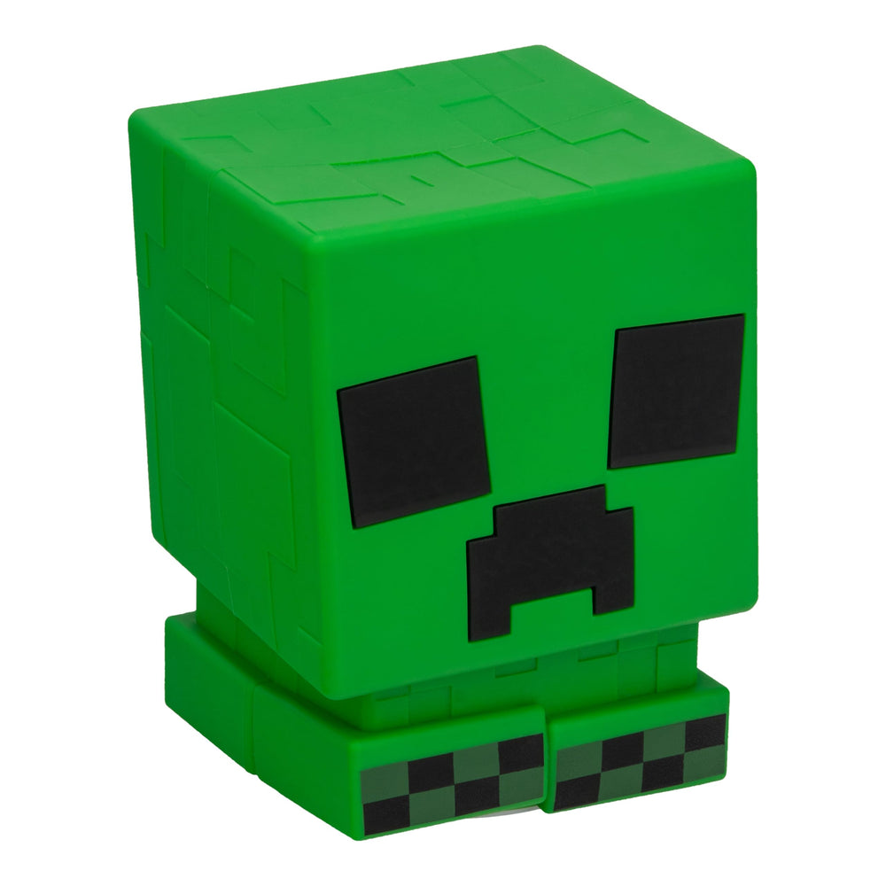 Paladone Minecraft Creeper SquishyGlo light turned on, showing vivid green glow for kid-friendly bedside lighting.
