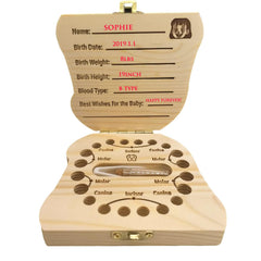 PAMBO tooth fairy box interior with openings for first teeth arranged