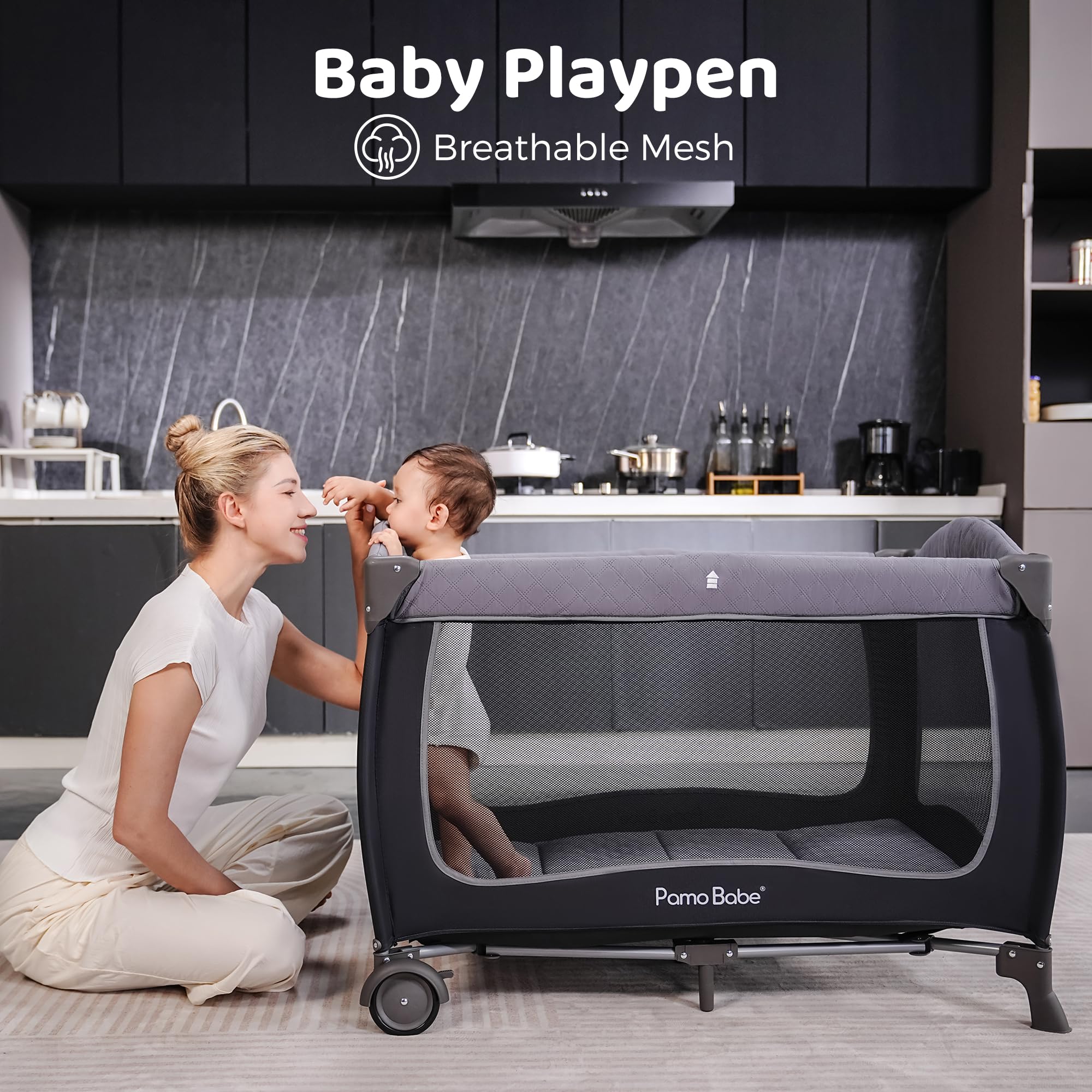 Pamo Babe bassinet area inside playard supports comfortable daytime naps.