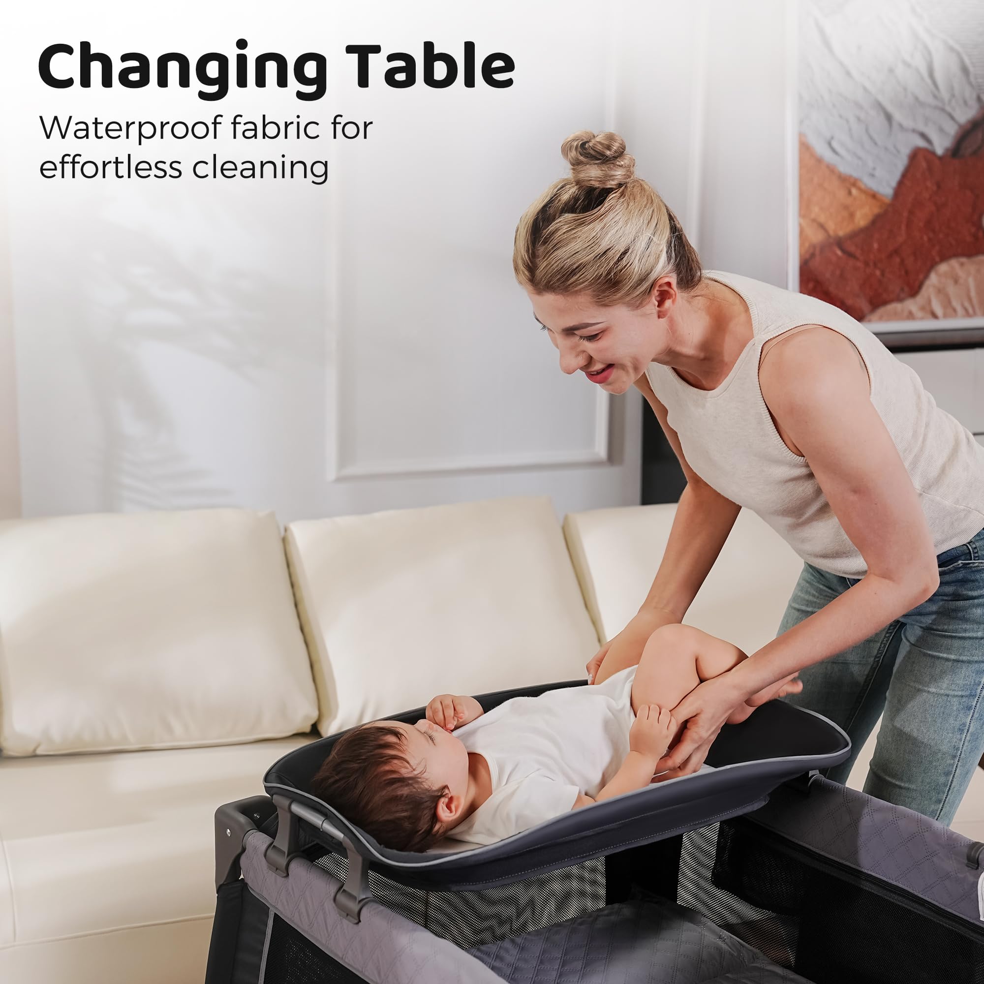 Pamo Babe foldable playard stores compactly for travel and small spaces.