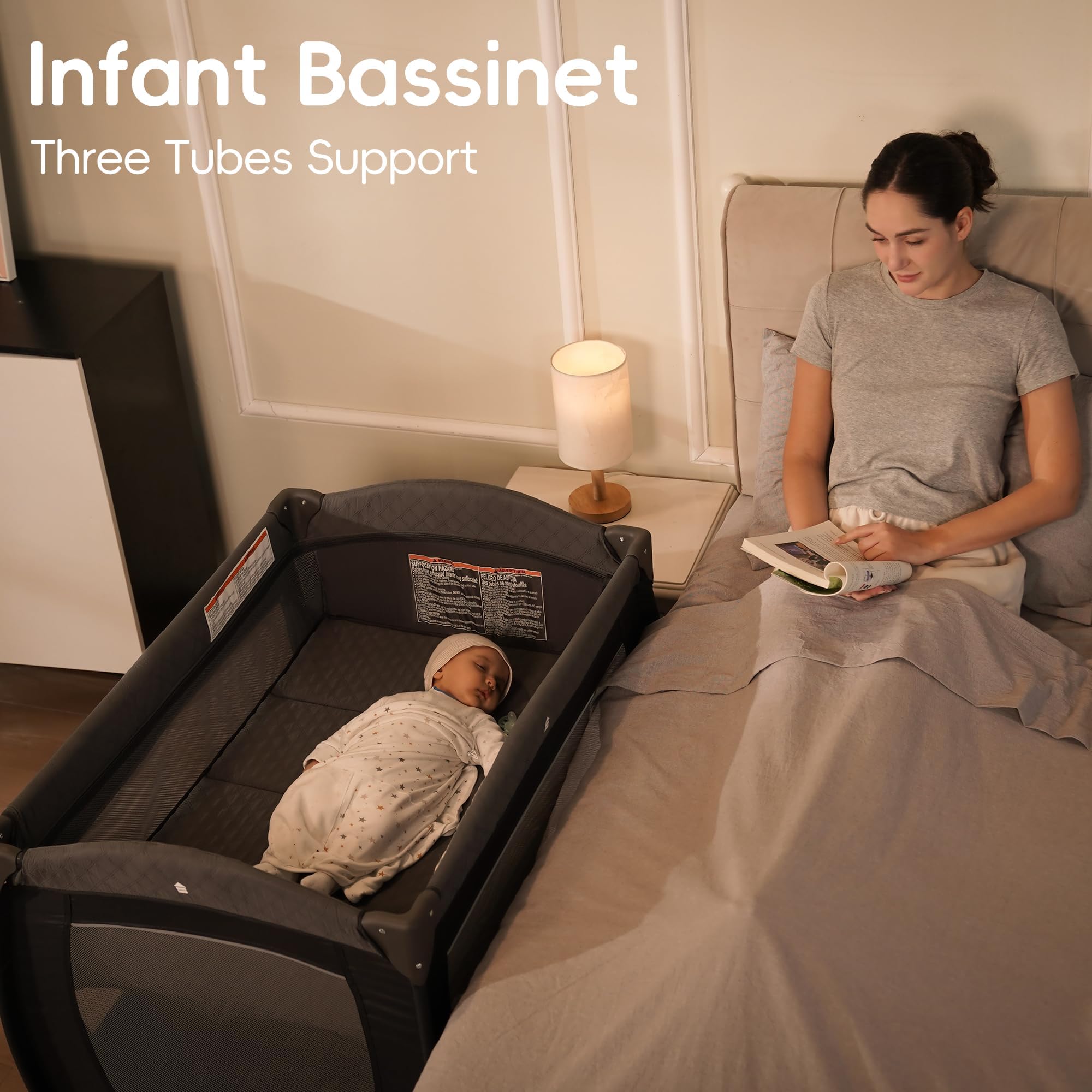 Pamo Babe Playard folding action gray demonstrates quick compact setup.