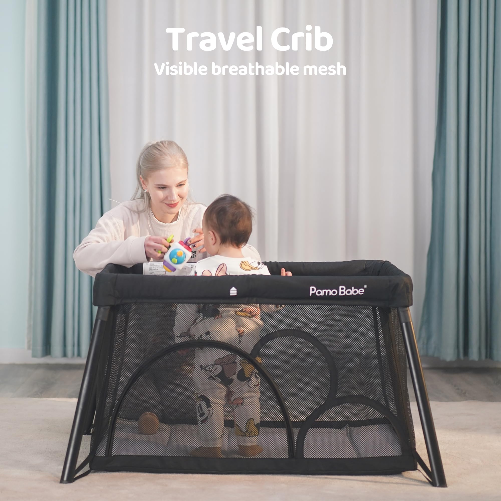Pamo Babe travel crib secure base maintains stability during playtime.