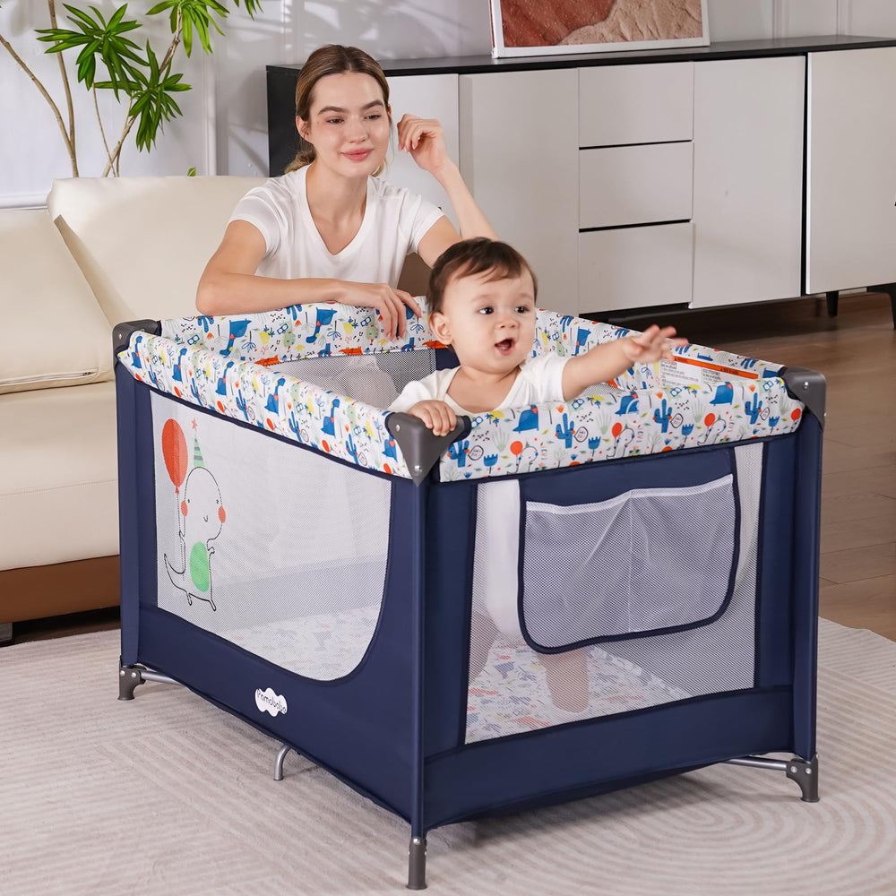 Pamo Babe blue bassinet with carry bag for travel ease.