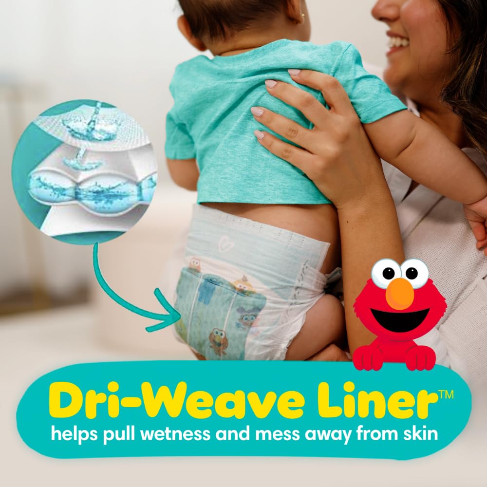 Pampers Baby-Dry stretchy sides provide secure, comfy fit.