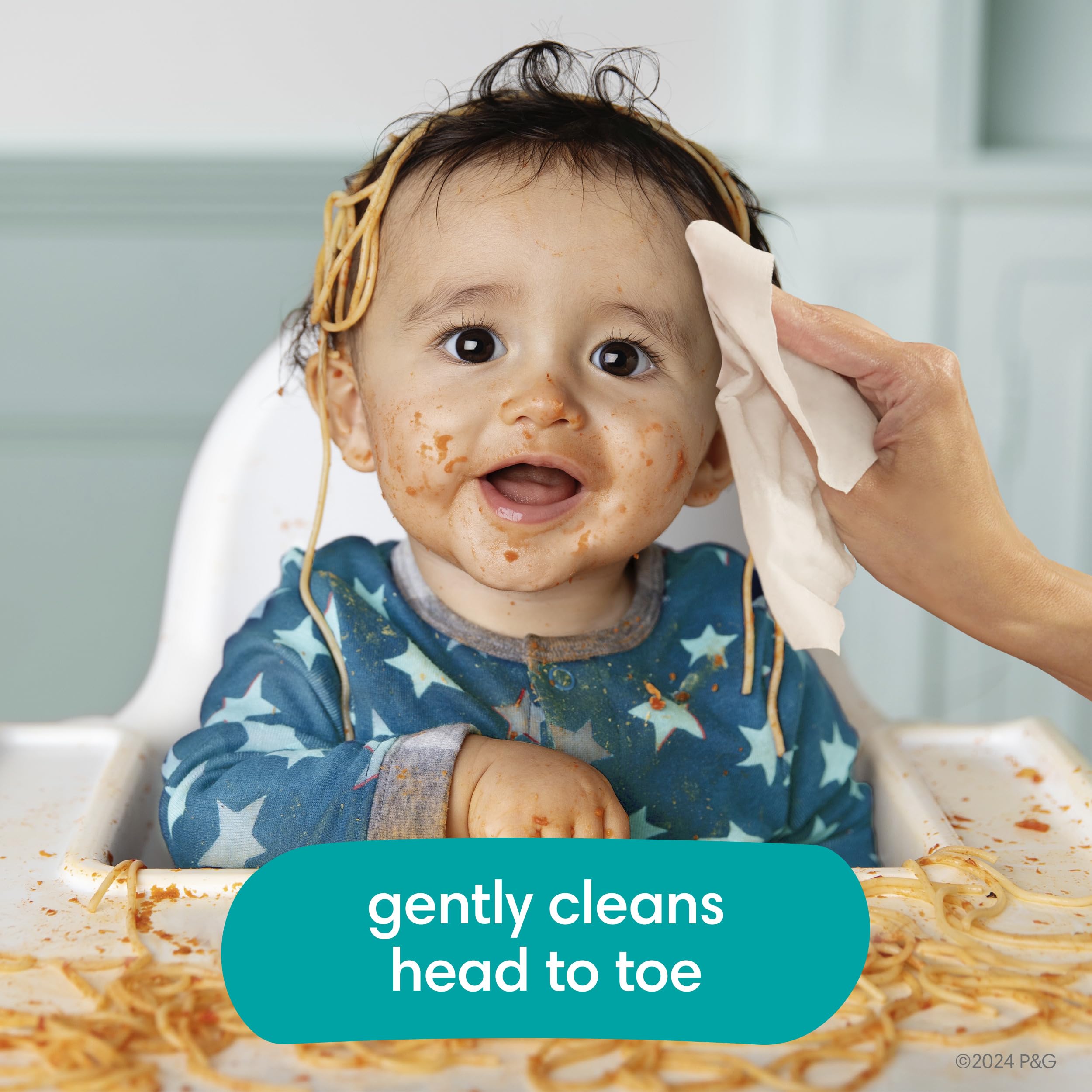 Pampers Baby Wipes wipe texture close-up emphasizes gentle soft cloth.
