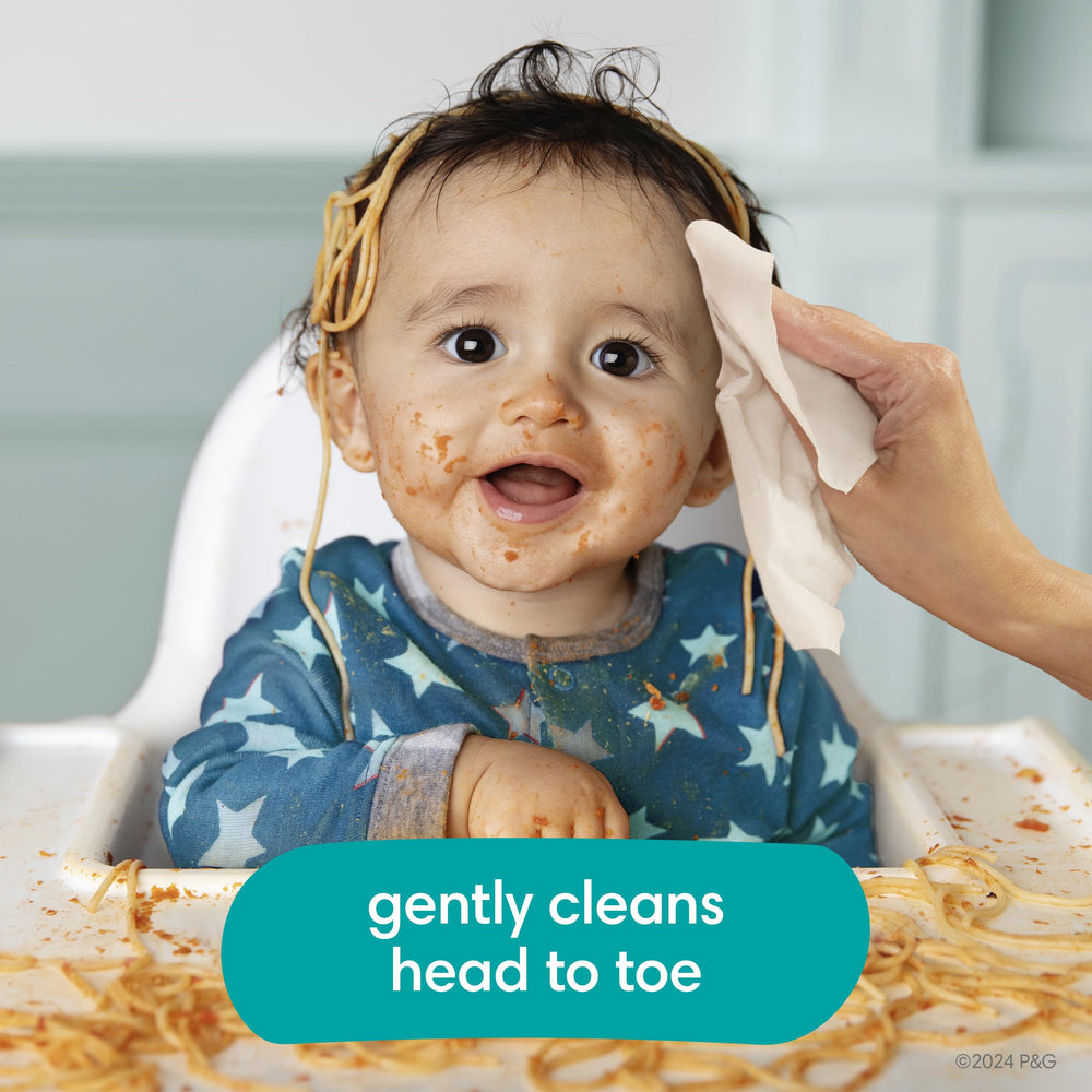 Pampers Baby Wipes wipe texture close-up emphasizes gentle soft cloth.