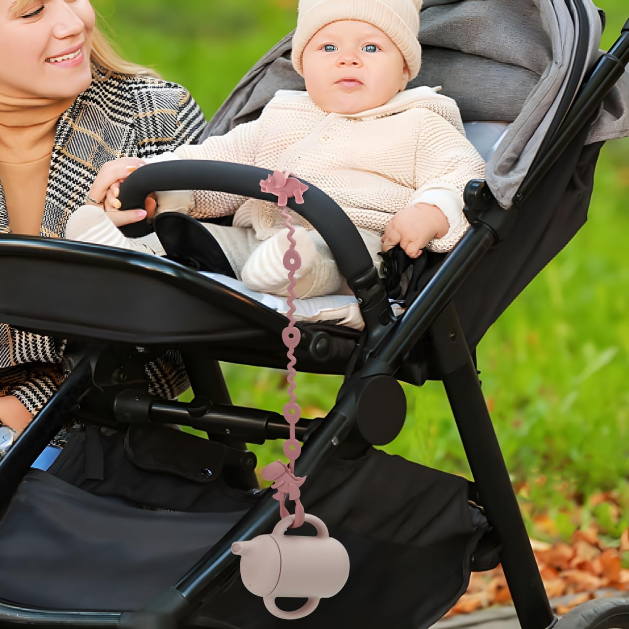 PandaEar car seat clip secures toys for car trips and naps.