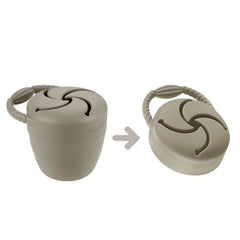 PandaEar collapsible snack cups tucked away in a bag for travel.