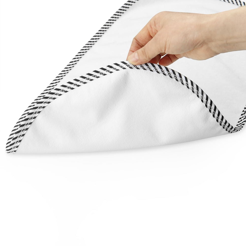 PandaEar changing liners are feather-light and portable for on-the-go diaper changes
