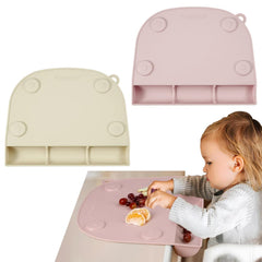 PandaEar suction placemat on table with four cups, catching spills to protect surfaces