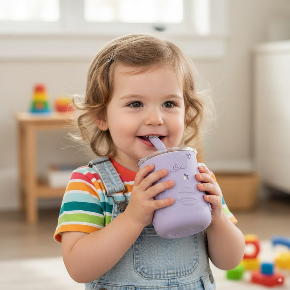 PandaEar toddler cup in blue sleeve enhances grip during meals and playtime.