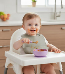 PandaEar baby bibs rolled into pocket demonstrates portable spill protection on the go