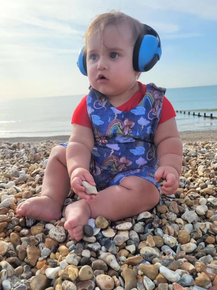 PandaEar blue earmuffs packaged with tote bag for travel and organization