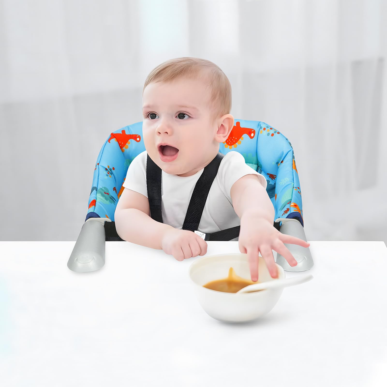 PandaEar hook-on baby seat after use showing easy wipe-clean design