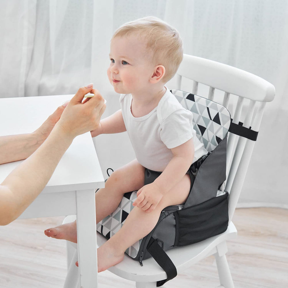 PandaEar Travel Booster Seat in-use-dining-table: provides a comfy, safe feeding space for toddlers.