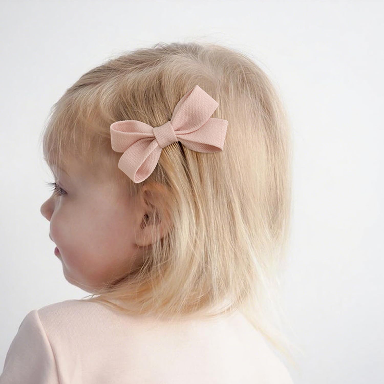 Panpinmama toddler-size bows 2.5 inches fit fine hair comfortably.