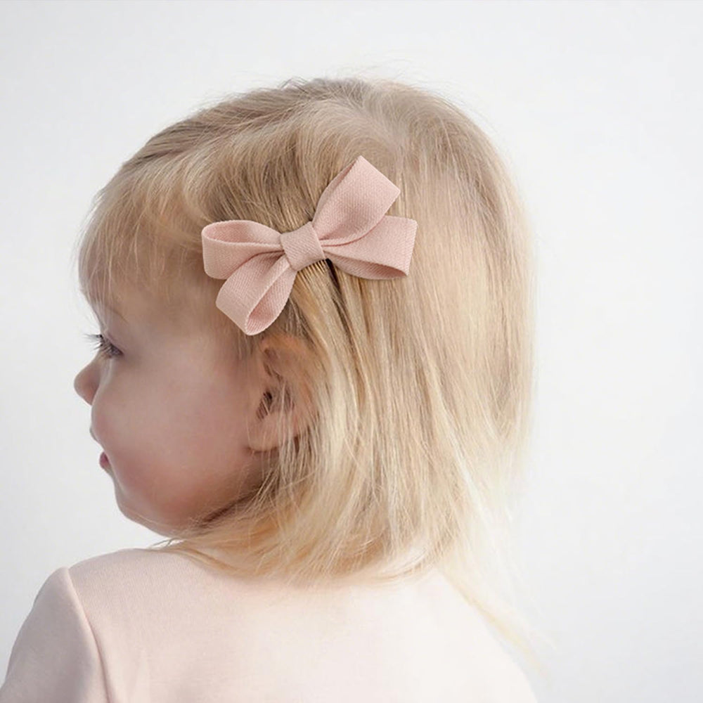 Panpinmama toddler-size bows 2.5 inches fit fine hair comfortably.