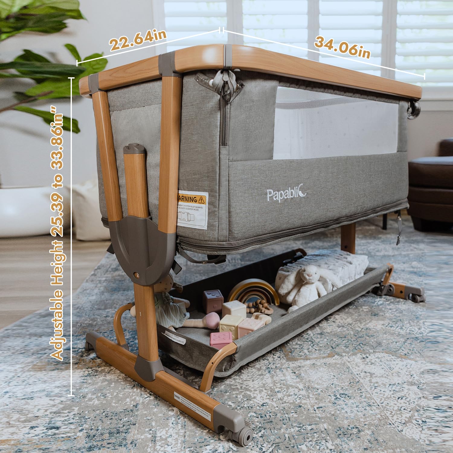 Papablic 4-in-1 bassinet keeps essentials in the storage basket.