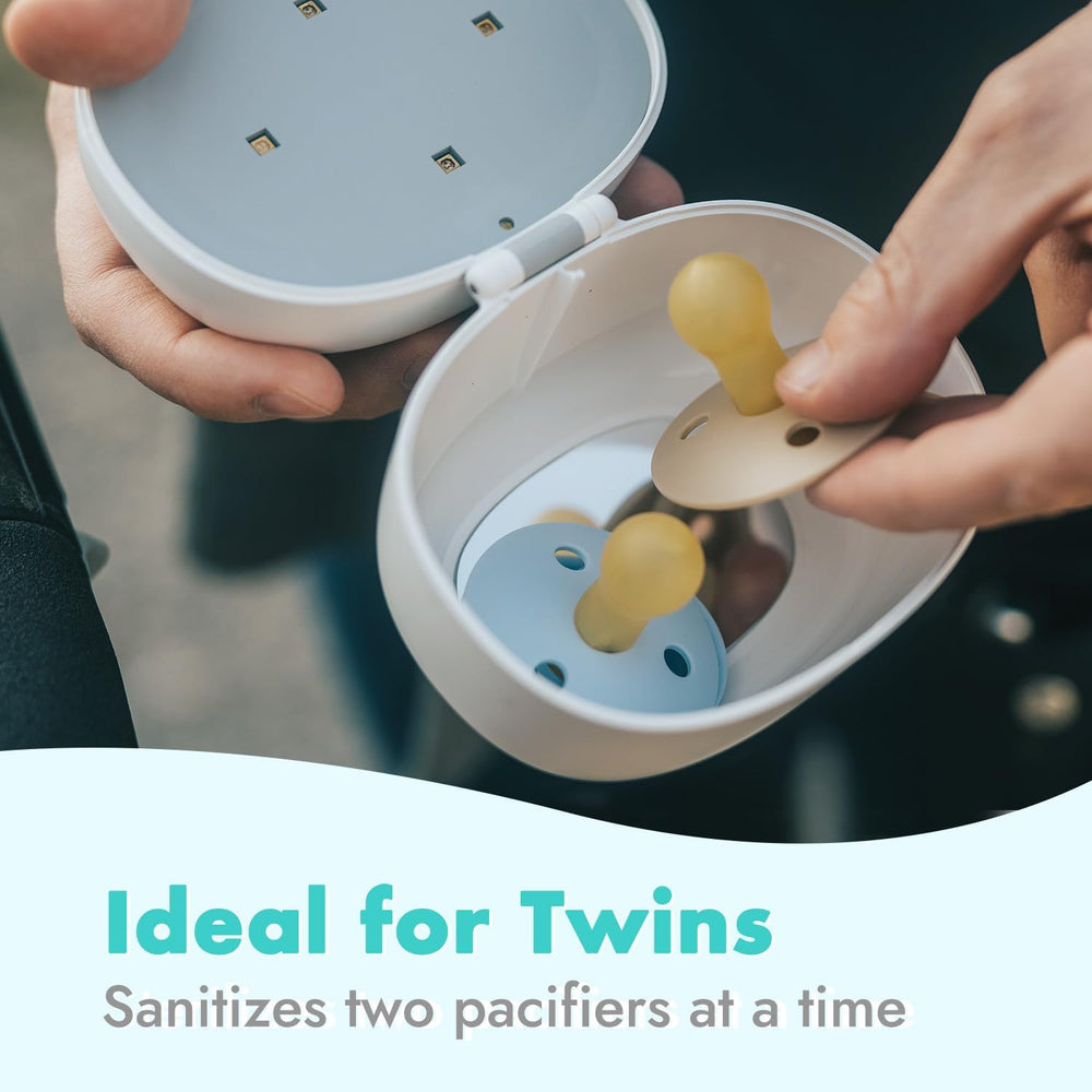 Papablic pacifier sanitizer travel strap keeps it handy in a diaper bag.