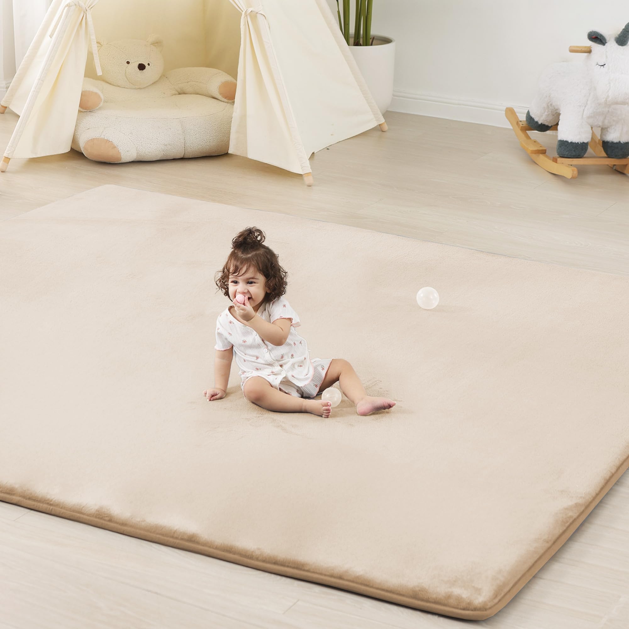PaPaMat 1.3-inch thick baby floor play mat rolled out for cushioning during tummy time