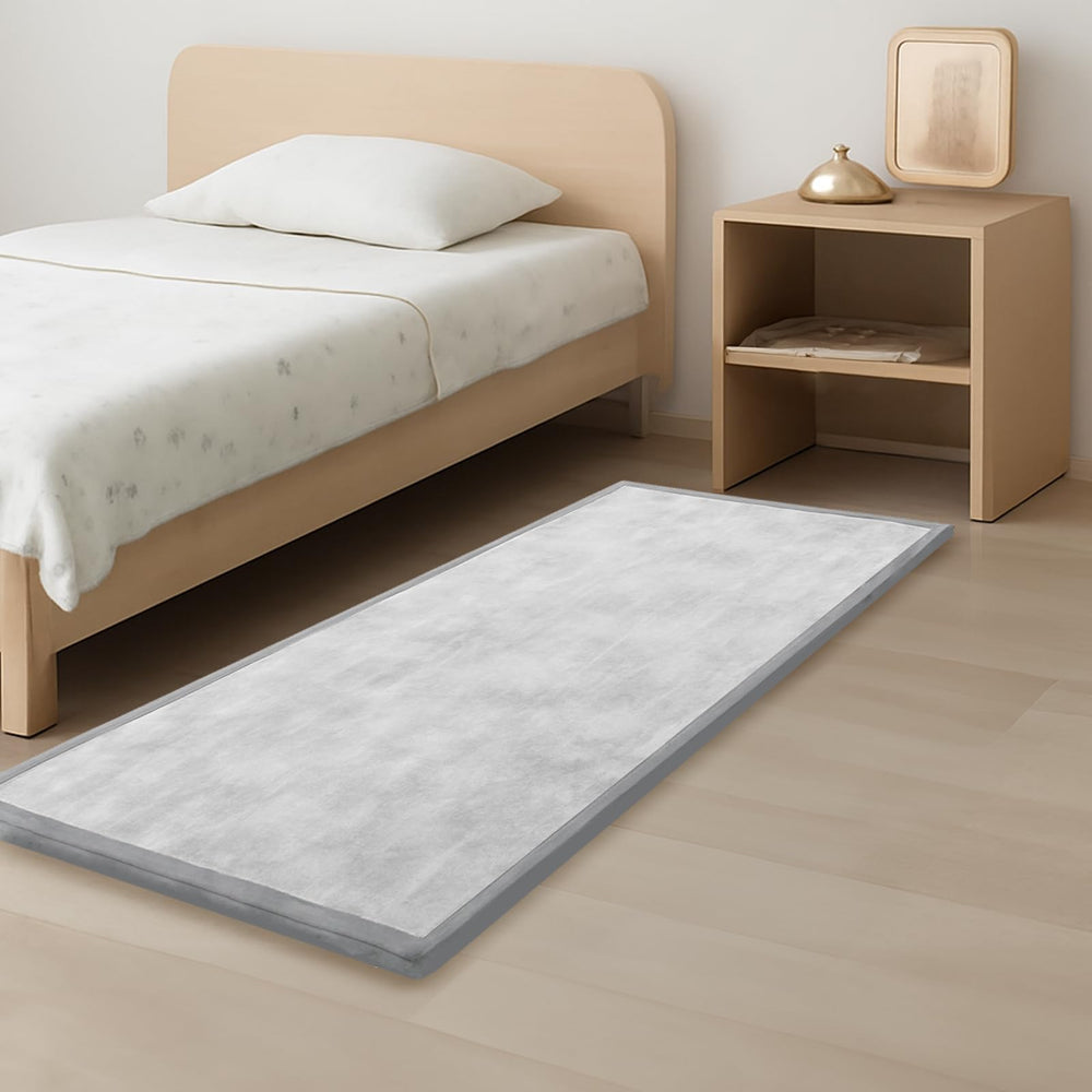 PaPaMat closeup of 1.3-inch thick plush play mat showing cushioned surface for soft landings.