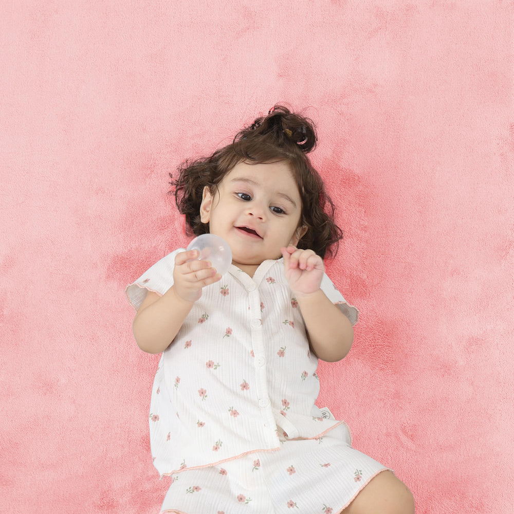 PaPaMat tummy-time setup featuring soft cushioning and ample space.