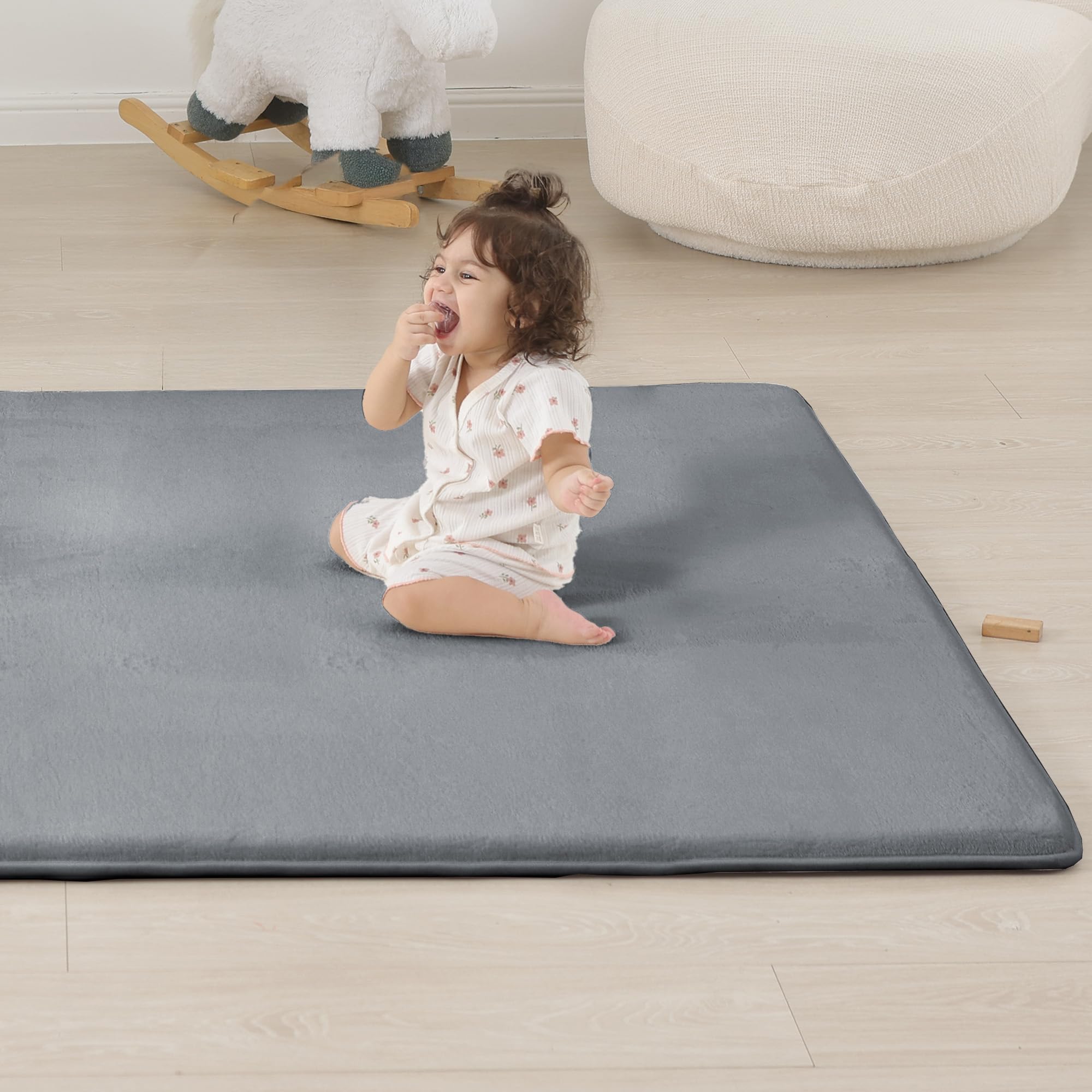 PaPaMat dark grey color blends with kids' spaces while offering a generous play area.