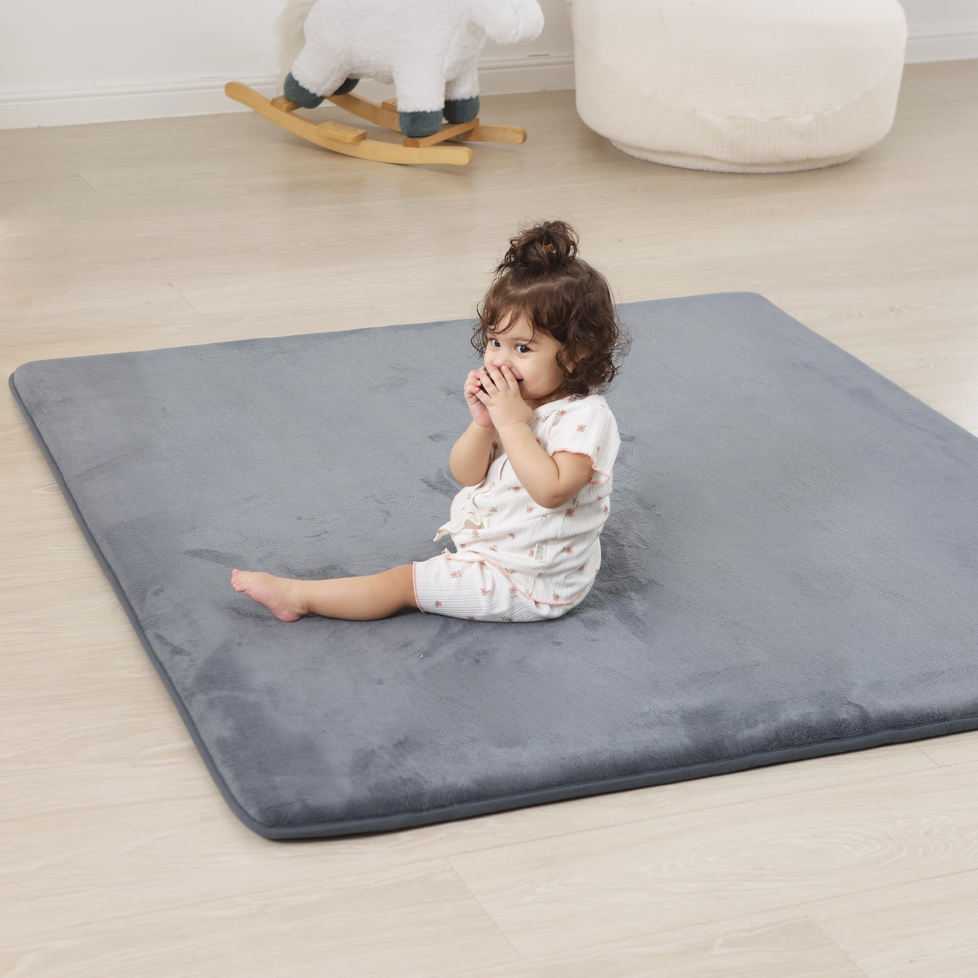 PaPaMat durable foam core cushions knees during active floor play.