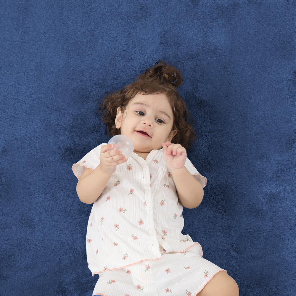 PaPaMat easy-clean velvet surface wipes clean after spills and messes.